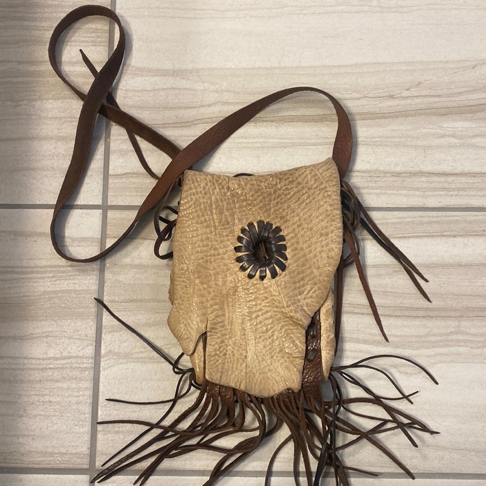 Jimmi Wz Leather crossbody bag. 9 in wide and 12 in long.